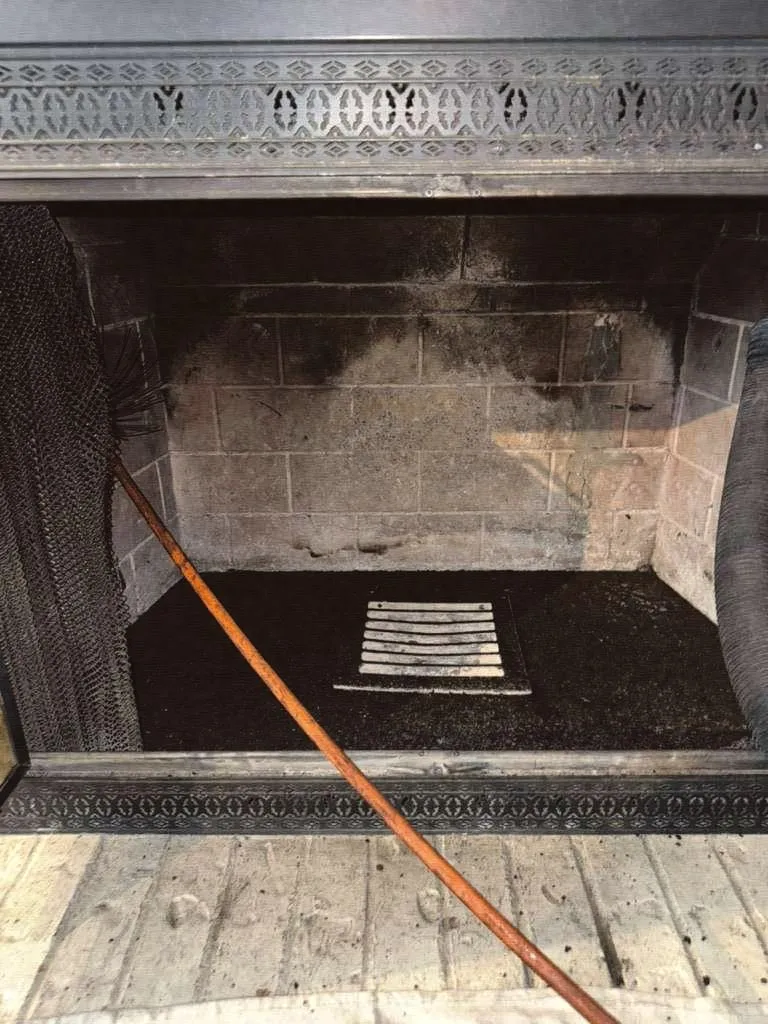 A sweeping cable running from a firebox up into the flue